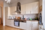 "Vermietete 85 m² Altbauwohnung mit Balkon und ausgebauten 63 m² DG am Preussenpark in Wilmersdorf" - Küche